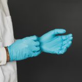 doctor-putting-on-gloves-2021-09-23-22-34-42-utc-160x160-1.jpg